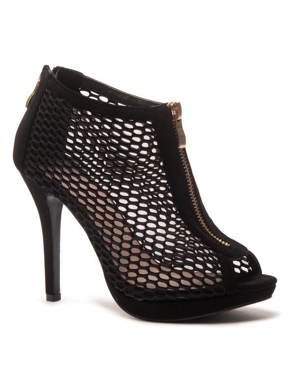 Bottine noire avec fermeture éclair décorative et résille