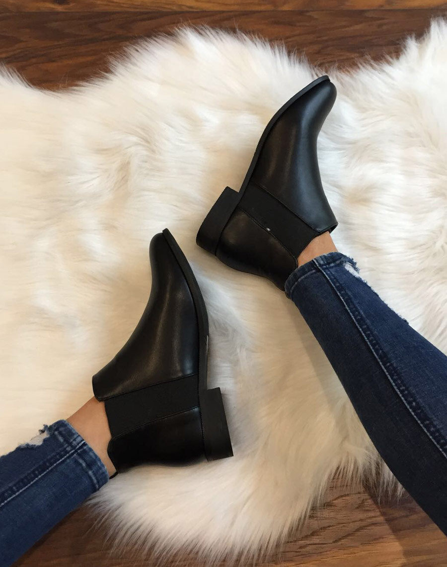 Bottines Chelsea noirs plats