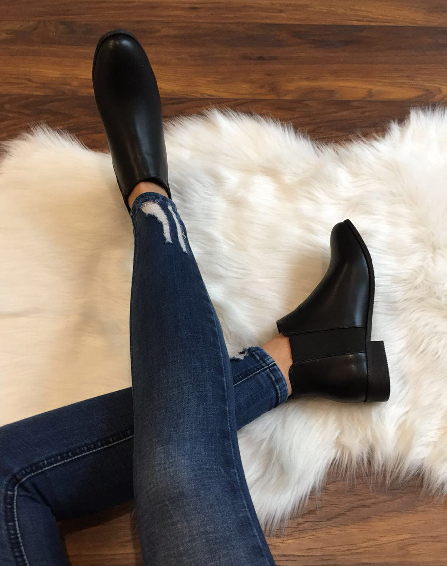 Bottines Chelsea noirs plats