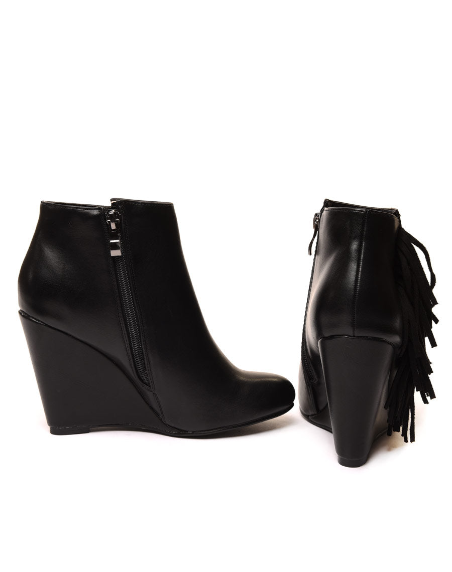 Bottines compensées noires à franges en suédine