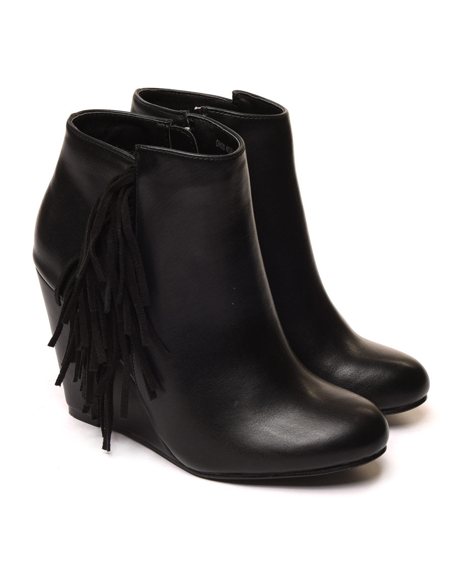 Bottines compensées noires à franges en suédine
