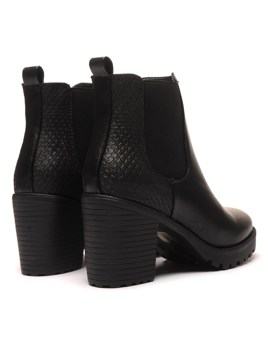 Bottines crantées noires imprimés python