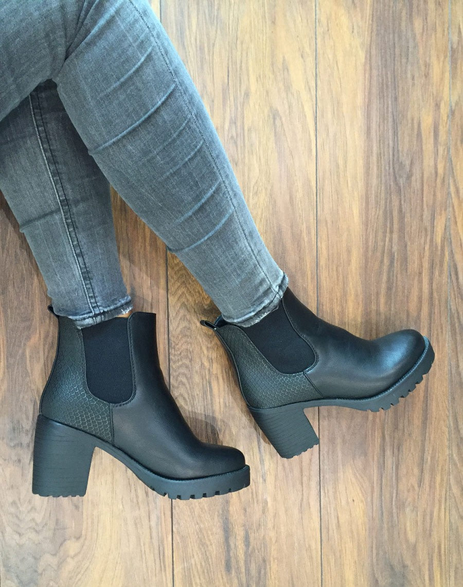 Bottines crantées noires imprimés python