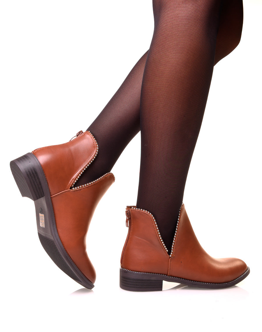 Bottines effet python ajouré à clous ronds