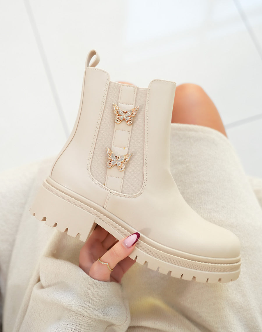 Bottines femme beige style Chelsea avec papillons dorés et semelle crantée