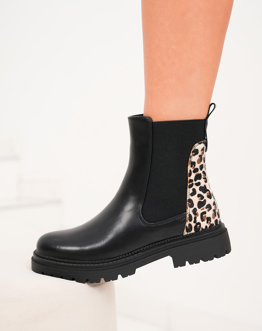 Bottines femme noires avec empiècement léopard et semelle crantée