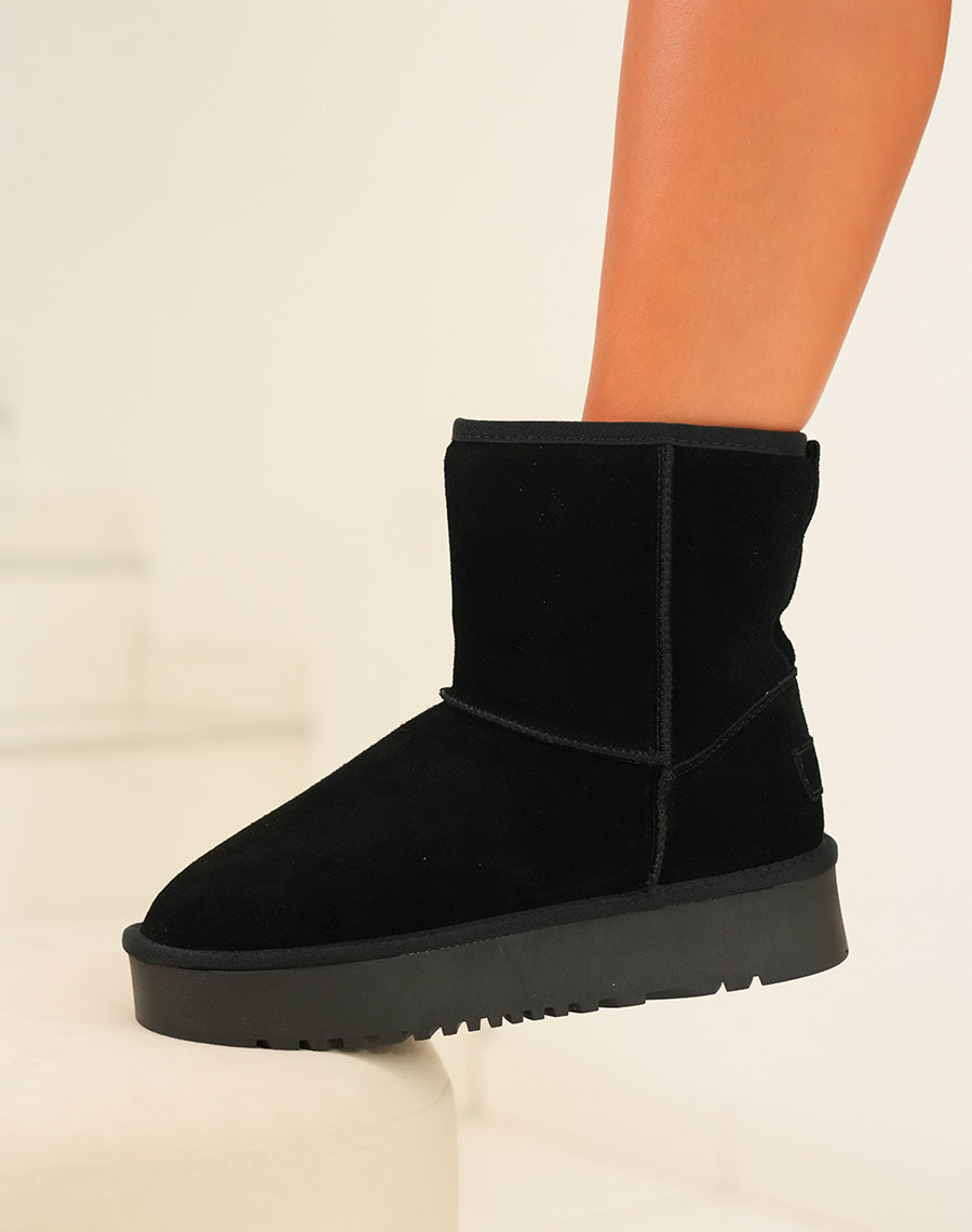 Bottines femme noires en cuir avec plateforme épaisse et intérieur fourré