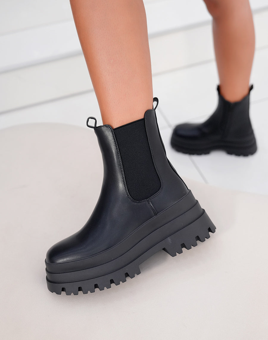 Bottines femme noires style Chelsea avec triple plateforme et semelle crantée