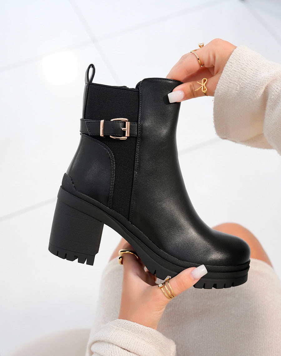 Bottines femme noires à talon avec lanière dorée et semelle crantée