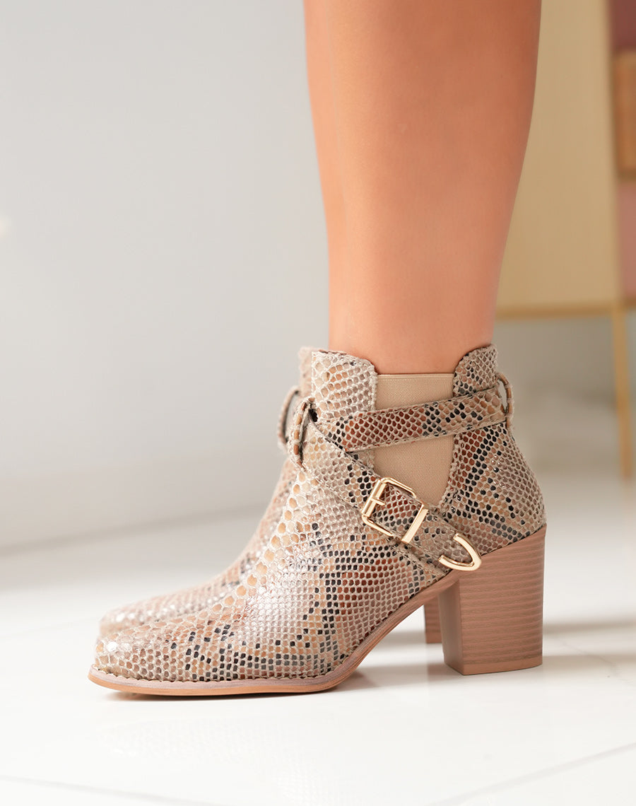 Bottines Femme à talon motif serpent et détails croisés