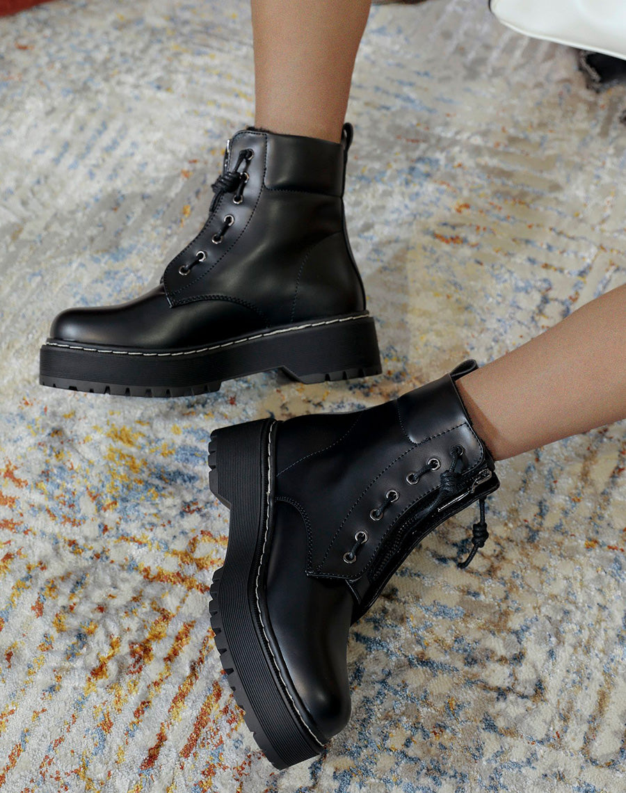Bottines montantes noires avec fourrure