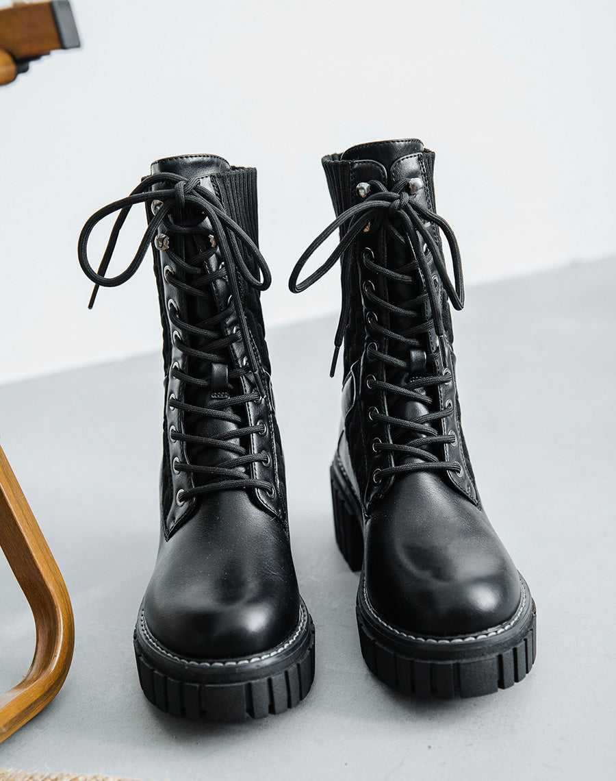 Bottines montantes noires bi-matière à semelle talonnée et crantée