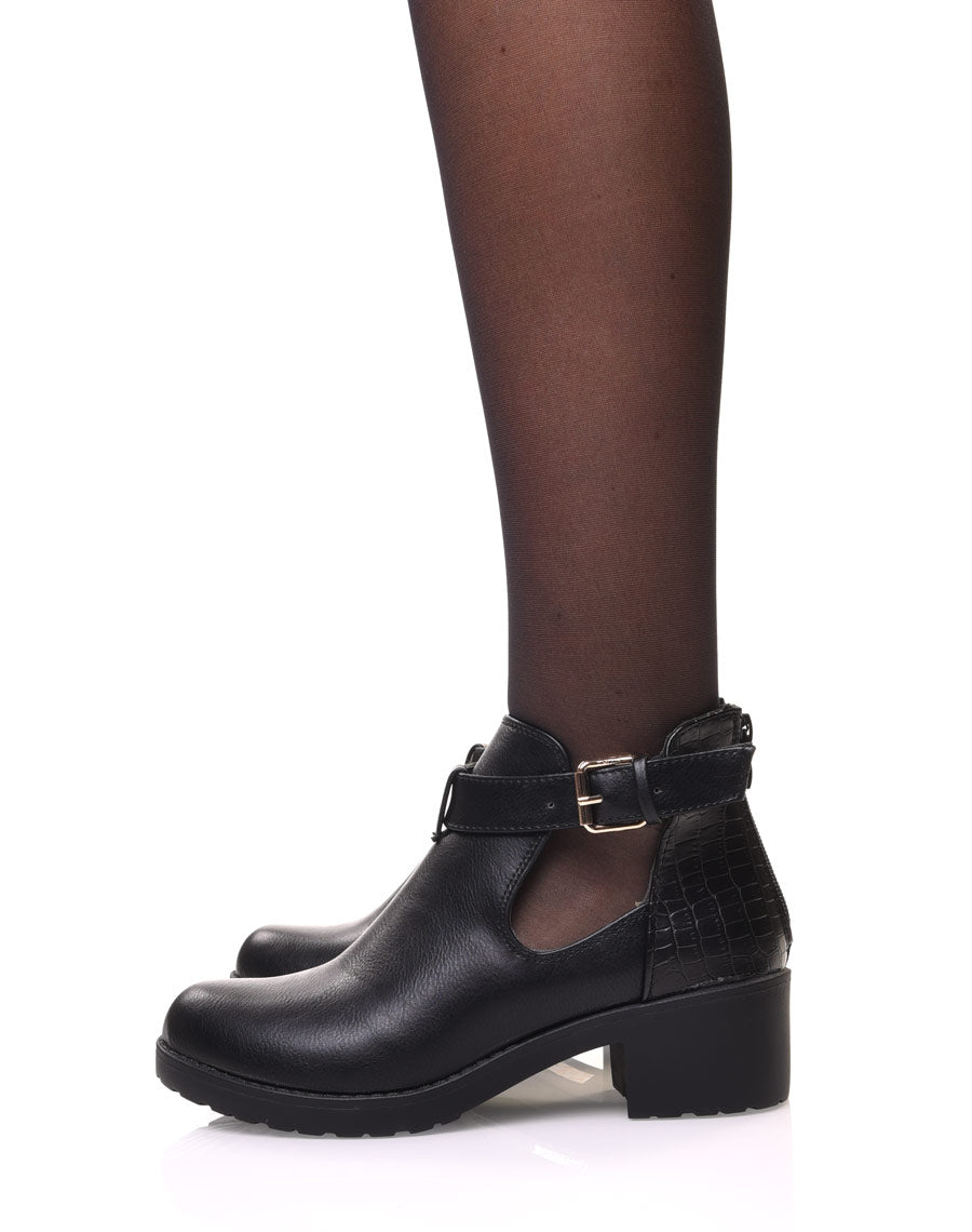 Bottines noires ajourées à petit talon et boucle