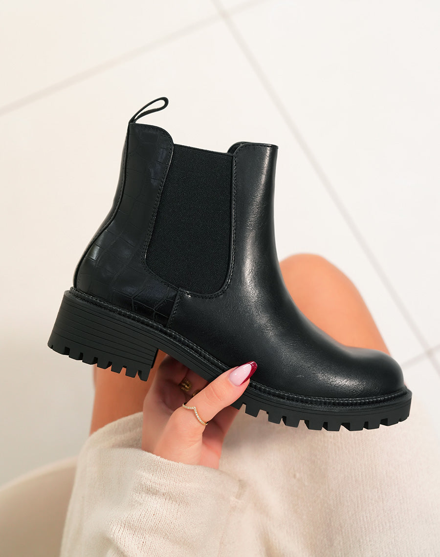 Bottines noires basses avec effet croco