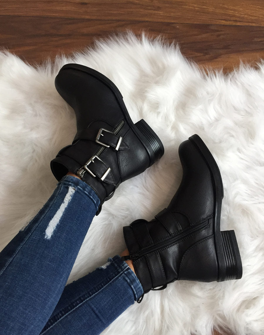 Bottines noires à boucles