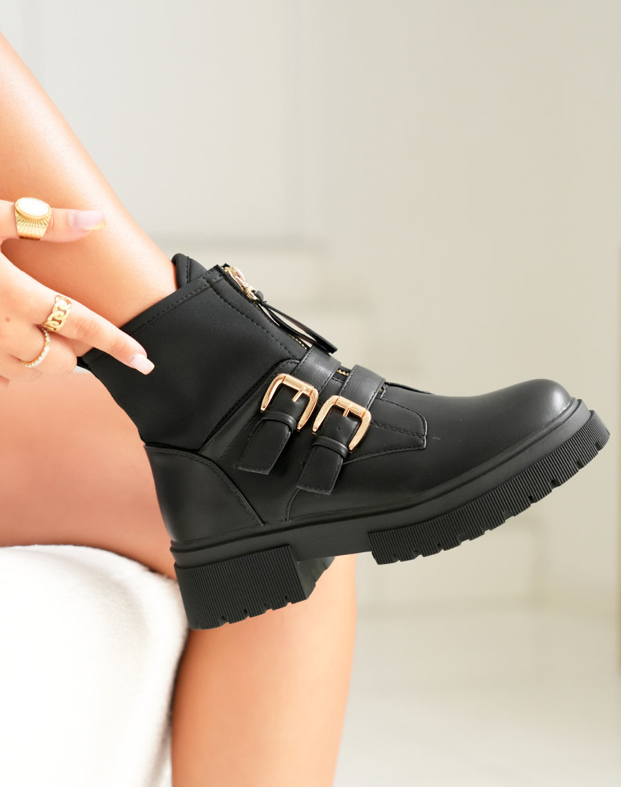 Bottines noires à zip doré et talon moyen main image 0