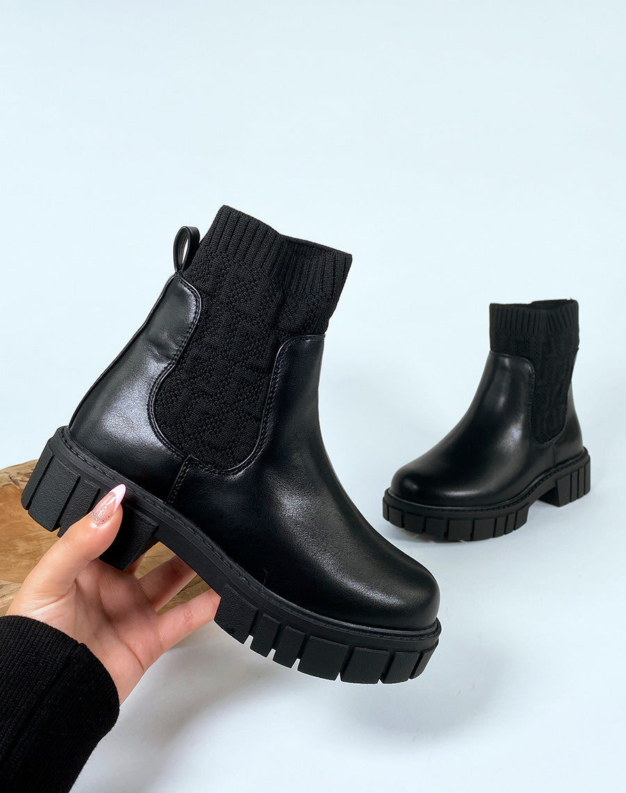 Bottines noires effet chaussette à motifs en relief