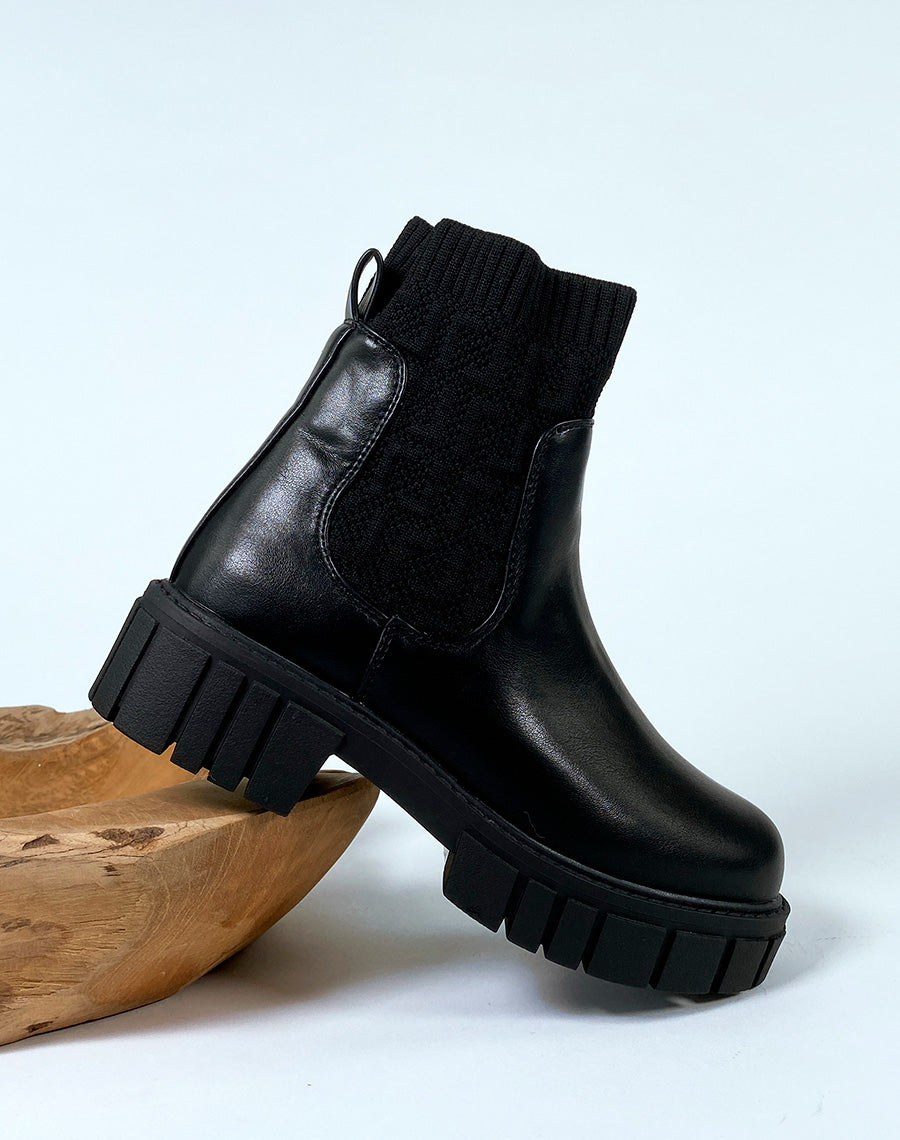 Bottines noires effet chaussette à motifs en relief
