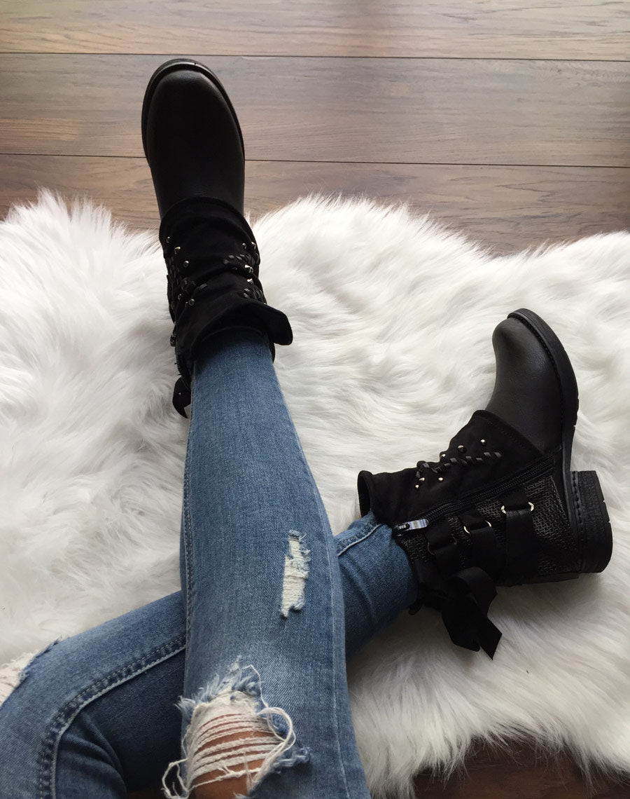 Bottines noires à empiècements bi-matières et noeud