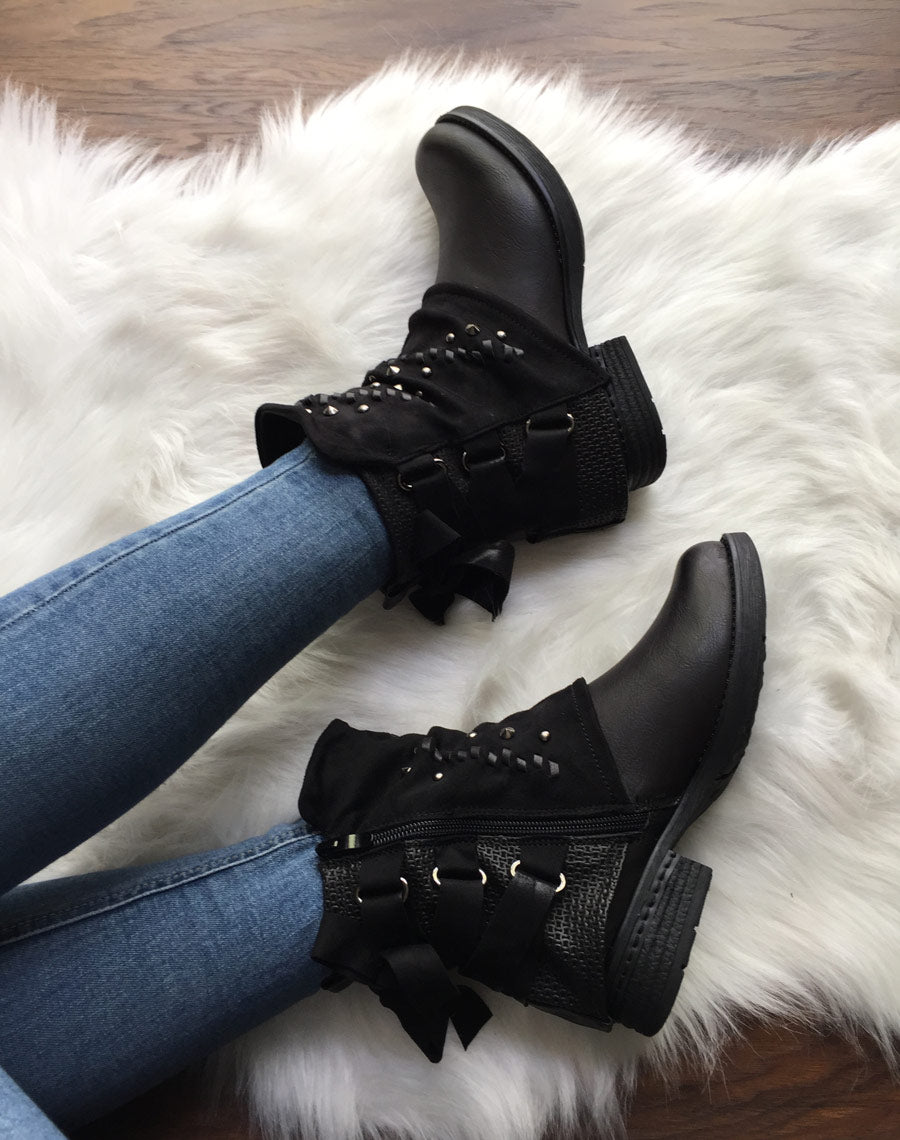 Bottines noires à empiècements bi-matières et noeud