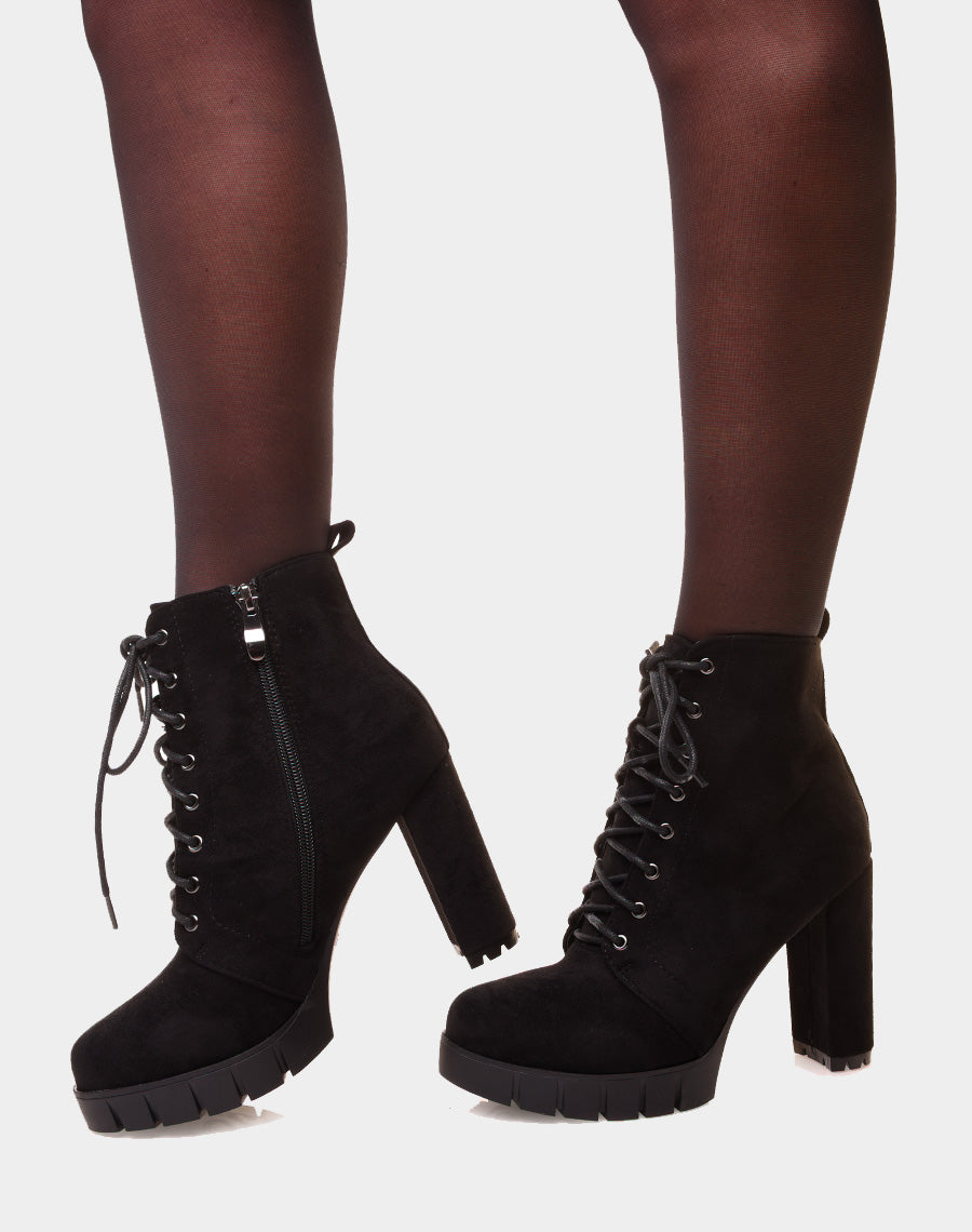 Bottines noires en suédine à talon et plateforme épaisse
