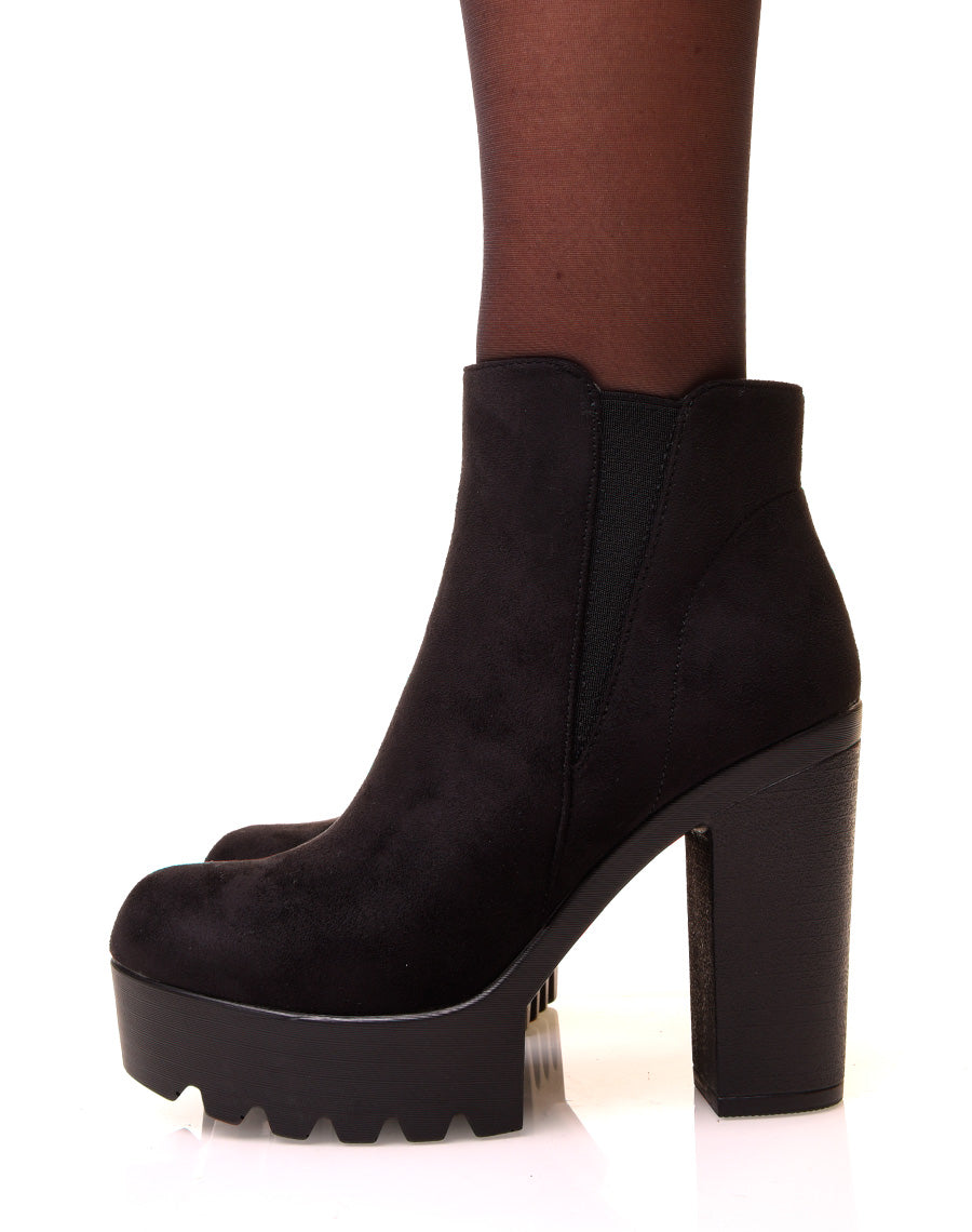 Bottines noires en suédine à talons et élastique échancré
