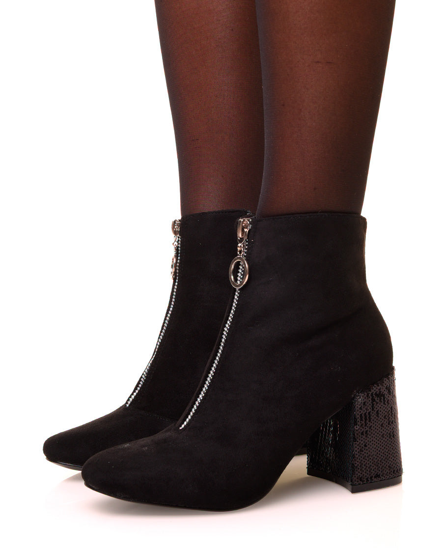 Bottines noires en suédine à talons pailletés