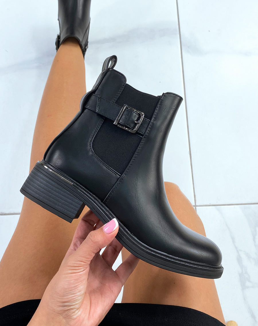 Bottines noires à lanière ajustable et talon à détail argenté