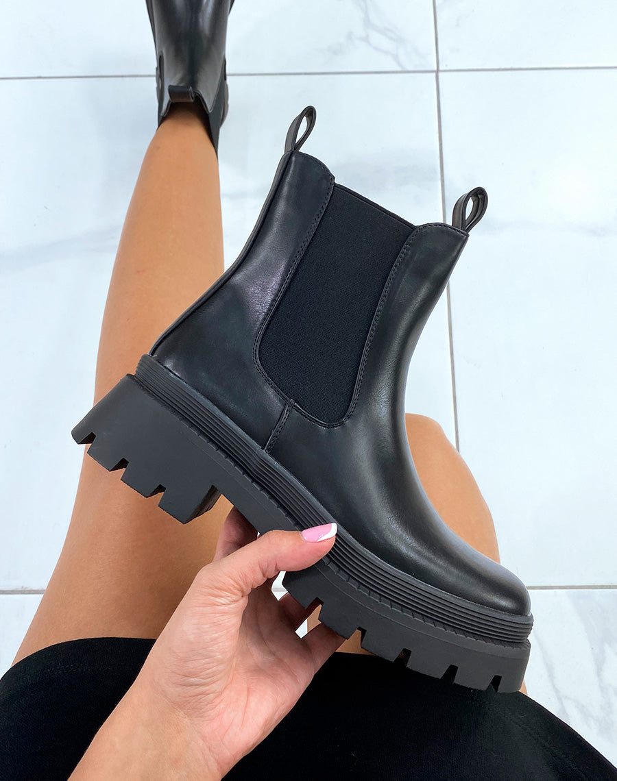 Bottines noires à élastique et double languettes
