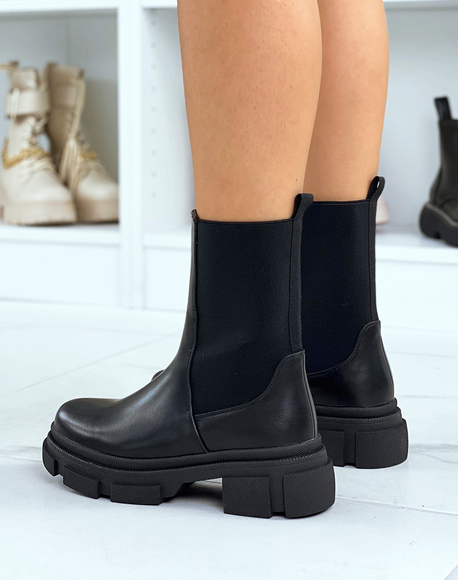 Bottines noires montantes à élastiques et semelle crantée