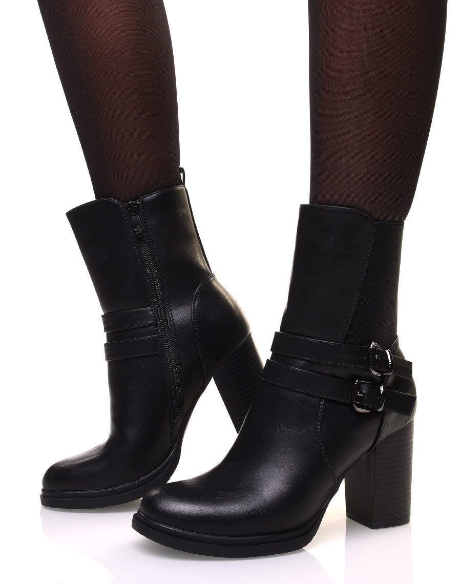 Bottines noires montantes à talons à sangles