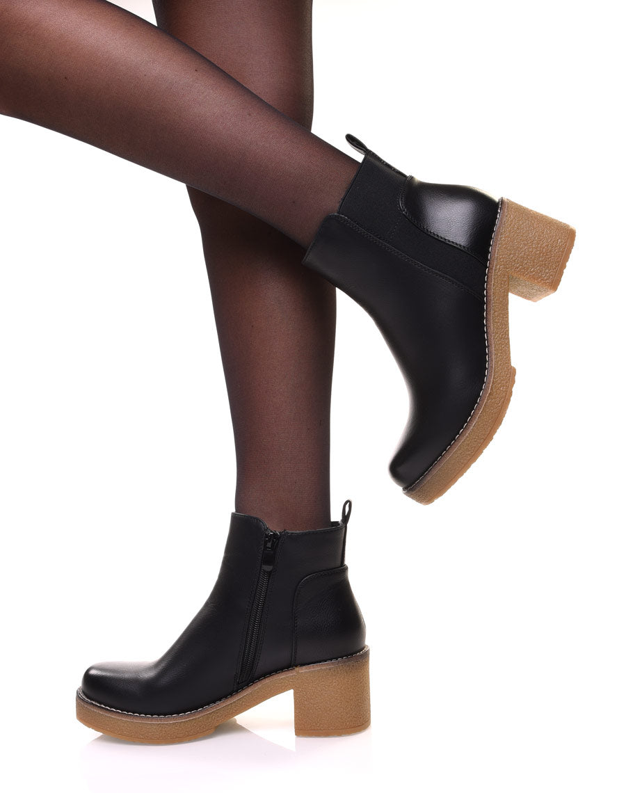 Bottines noires à semelle épaisse contrastée