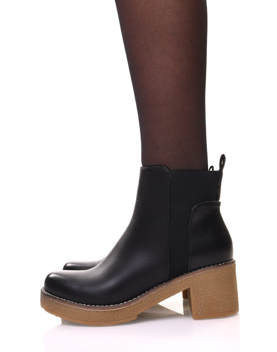 Bottines noires à semelle épaisse contrastée