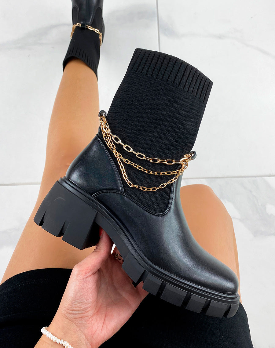 Bottines noires style chaussette à triple chaînes à talon