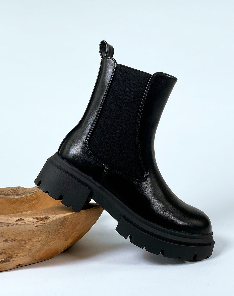 Bottines noires style chelsea boots à élastique et fermeture éclaire
