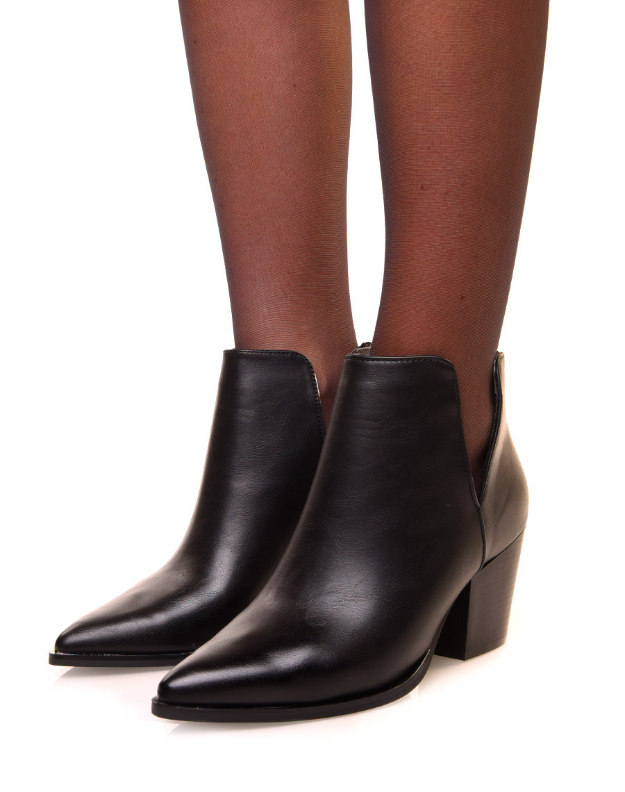 Bottines noires à talon biseauté et ajourées