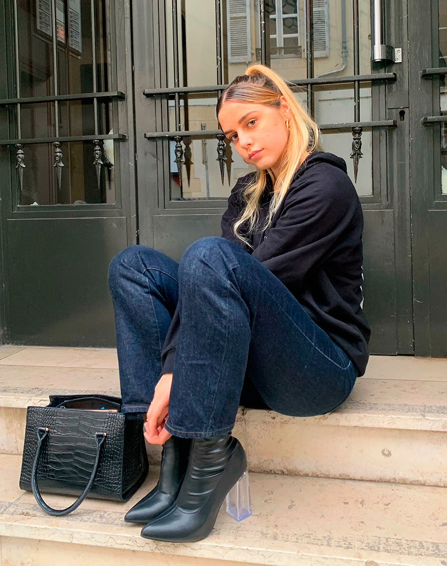 Bottines noires à talon transparent