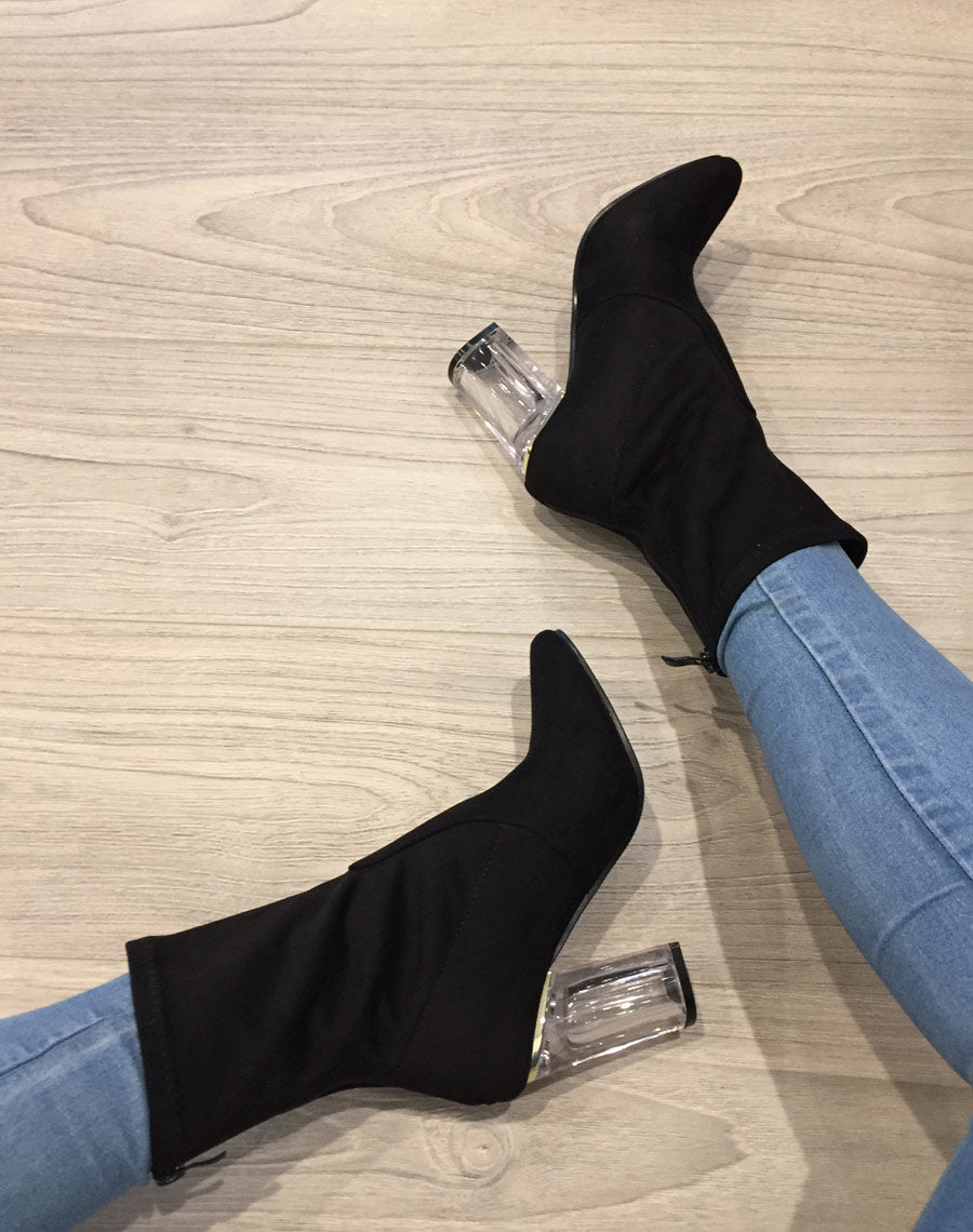 Bottines noires à talon transparent et haut souple