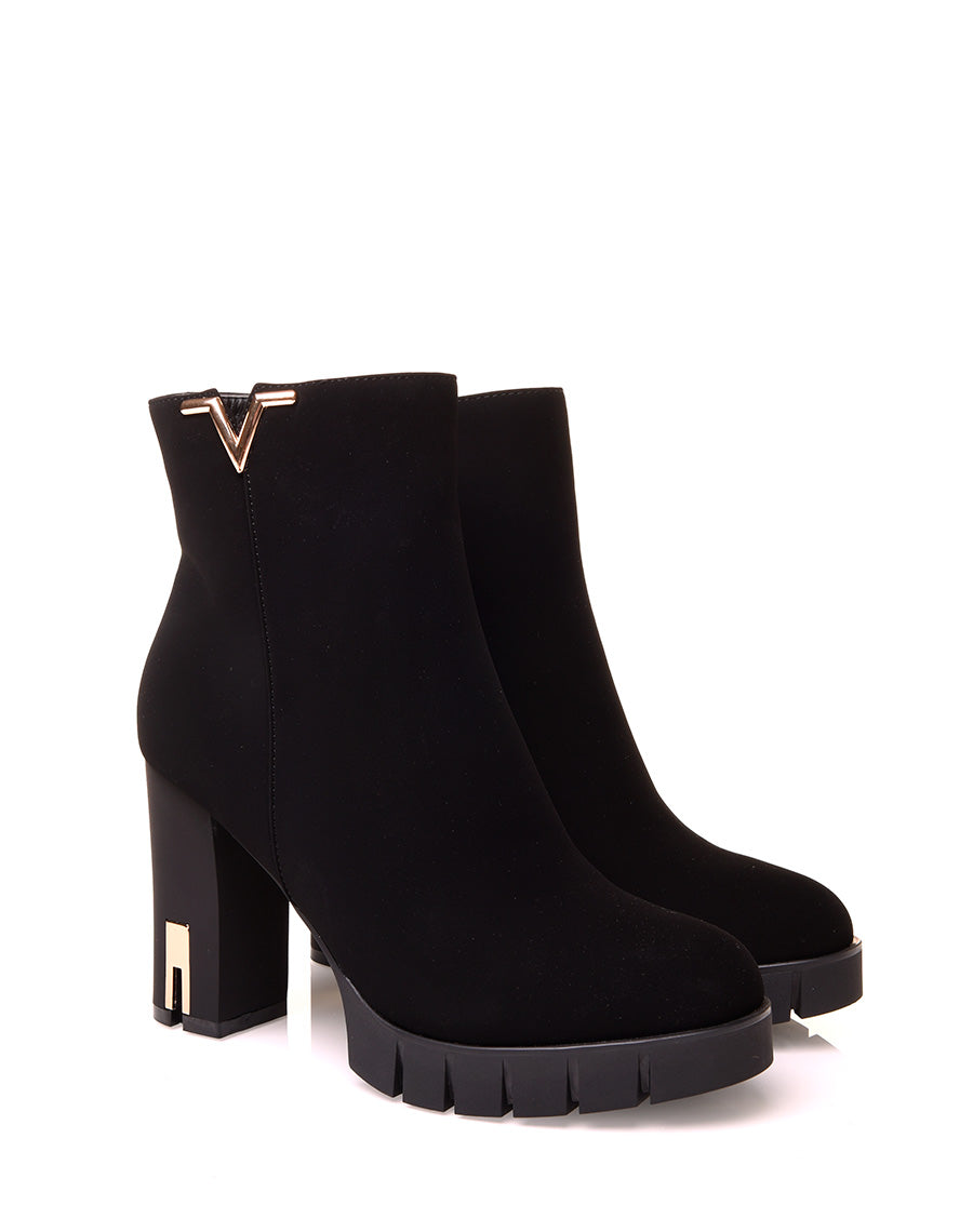Bottines noires à talons en suédine à détails dorés
