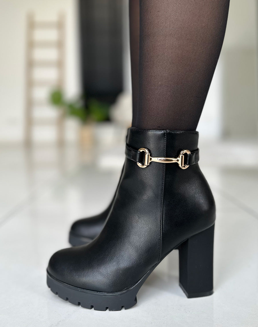 Bottines noires à talons et à détail doré