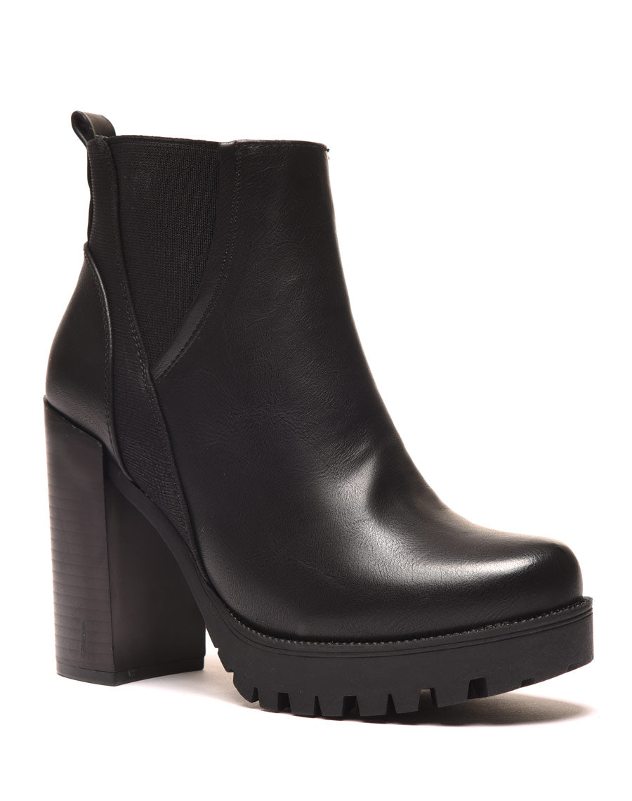 Bottines noires à talons et semelle épaisse