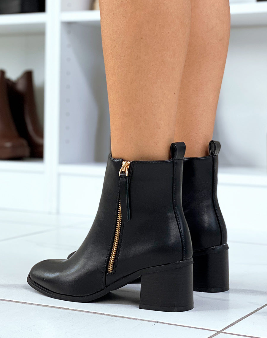 Bottines noires à zip doré et petit talon
