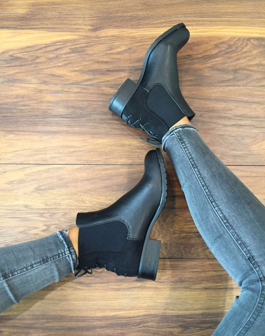 Bottines plates bi matières noires avec lacet décoratif arrière