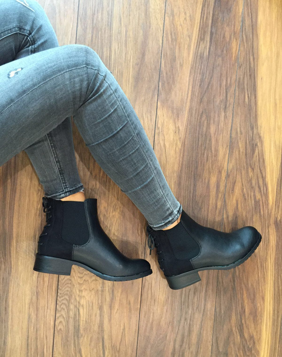 Bottines plates bi matières noires avec lacet décoratif arrière