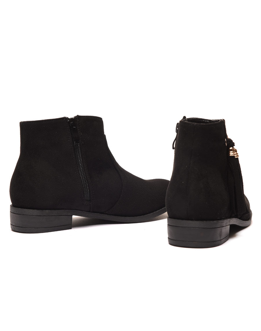 Bottines plates noires avec pompons à franges