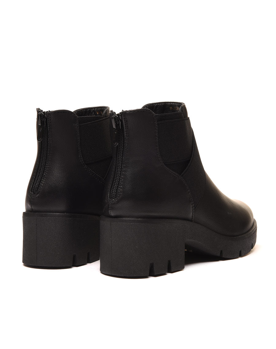 Chelsea boots noires à élastiques croisés