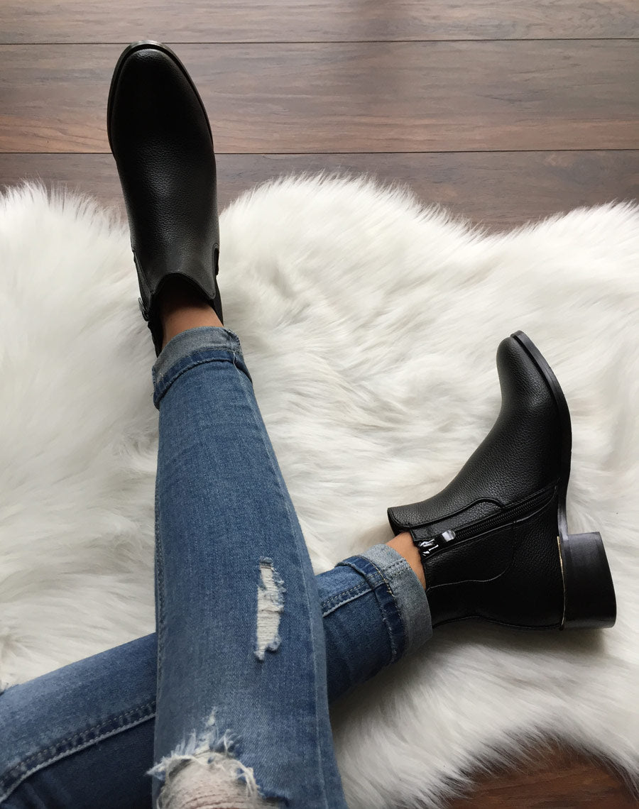 Chelsea boots noires à liseré doré