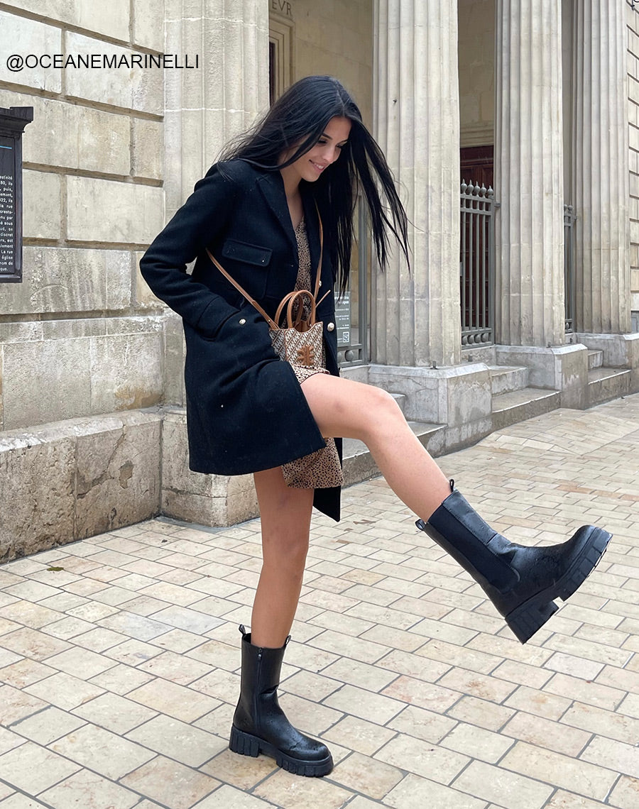 Chelsea boots noires montantes à semelle talonnée