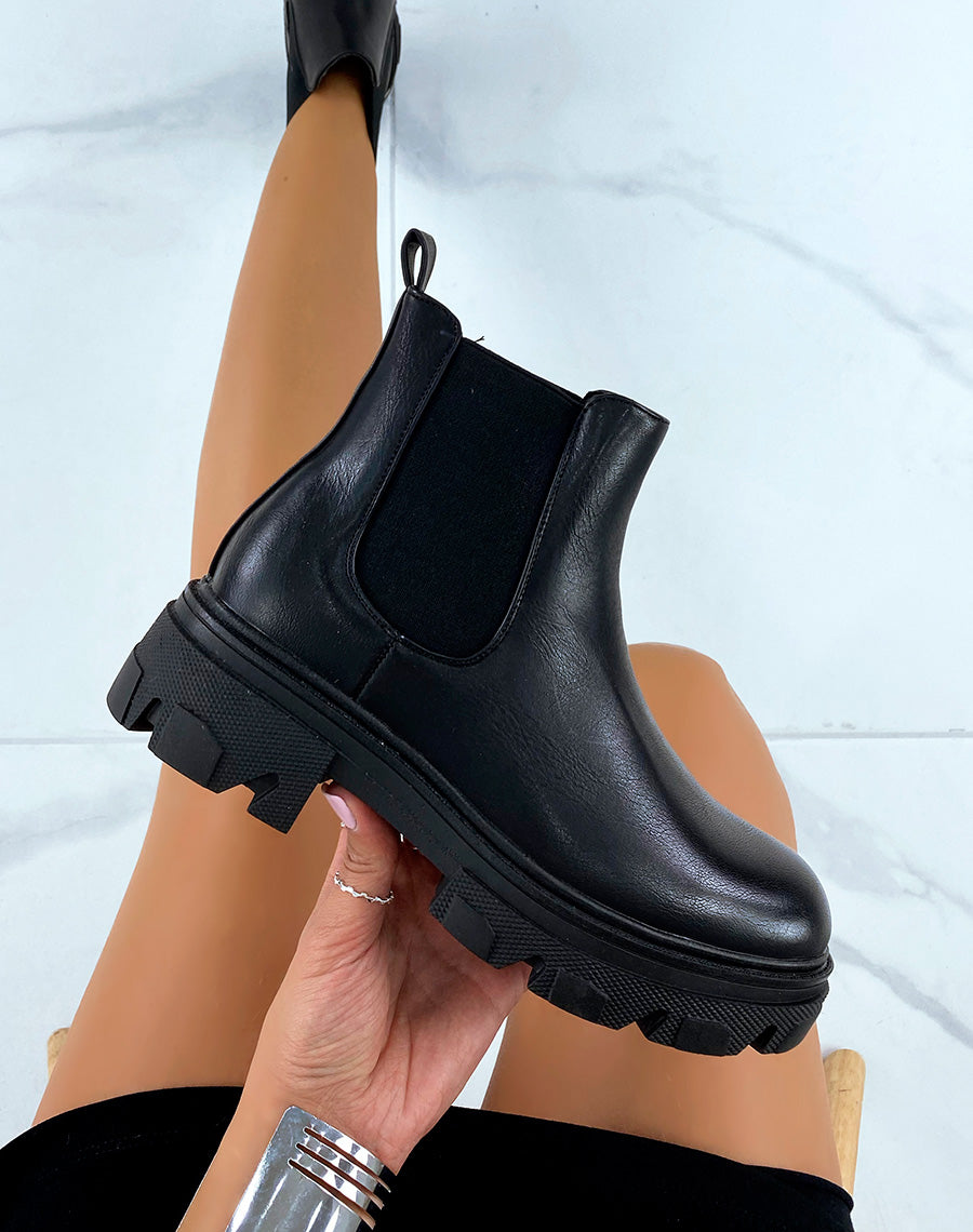 Chelsea boots noires talonnées à semelle crantée