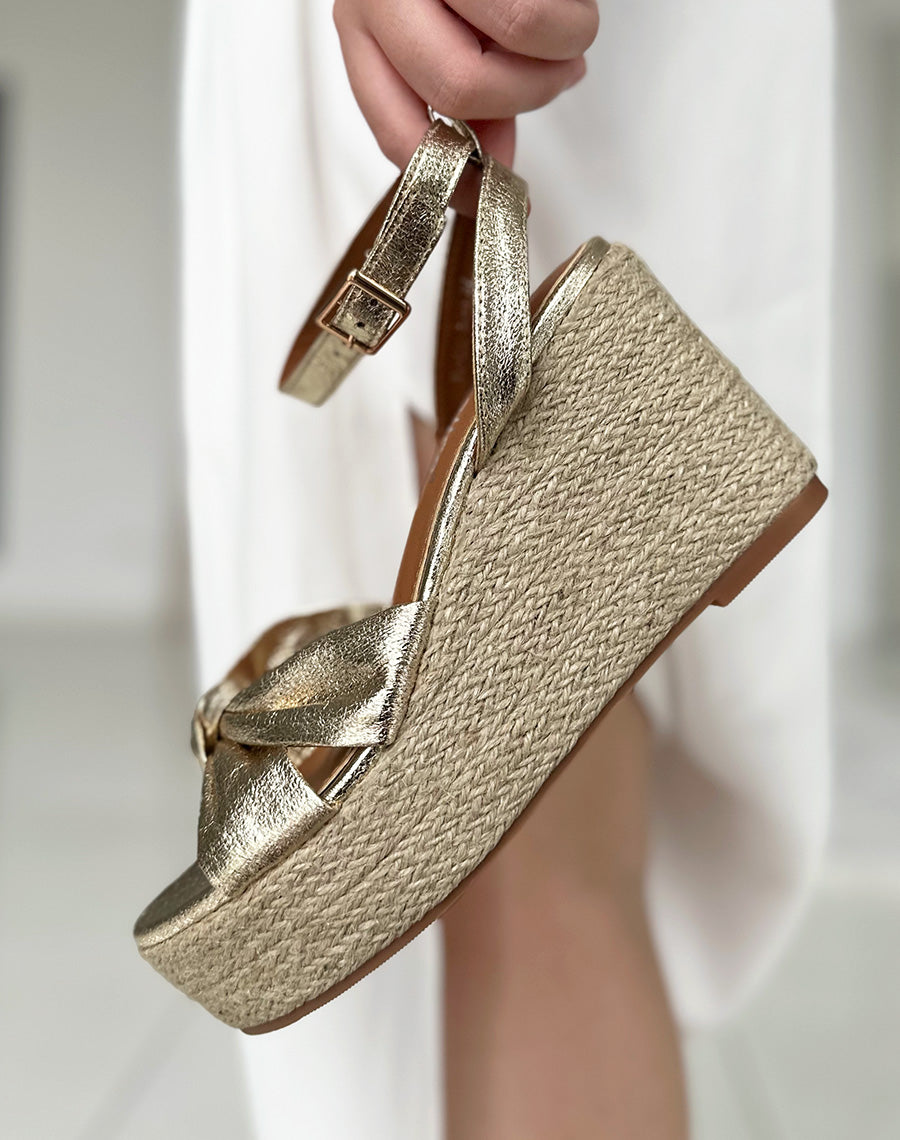 Compensées en jute et dorées